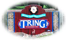 Yes, Tring does exist, and here's a picture of it's Town Boundry Shild